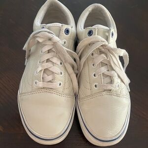 beige and navy blue leather old skool Vans